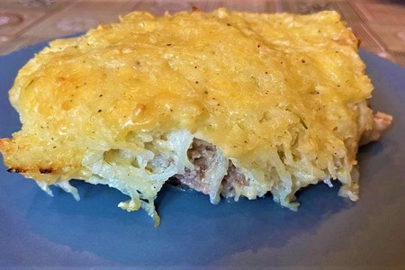 Нежная свинина в аппетитной картофельной корочке: простой рецепт для ужина