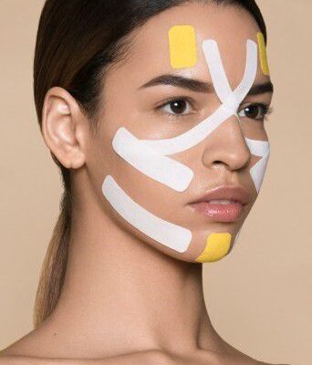 Тейпирование лица: секреты подтянутой и гладкой кожи